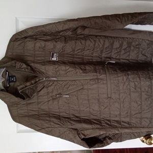 Banded 1/2 zip insulated liner jacket.